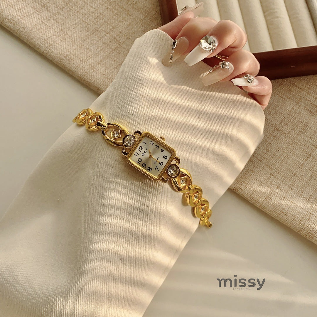 Parnika Gold Rectangle Watch [FJ6HZTAZ]