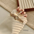 Parnika Gold Rectangle Watch [GWBYFTN7]