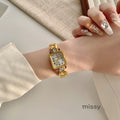 Parnika Gold Rectangle Watch [8H1U0L1W]