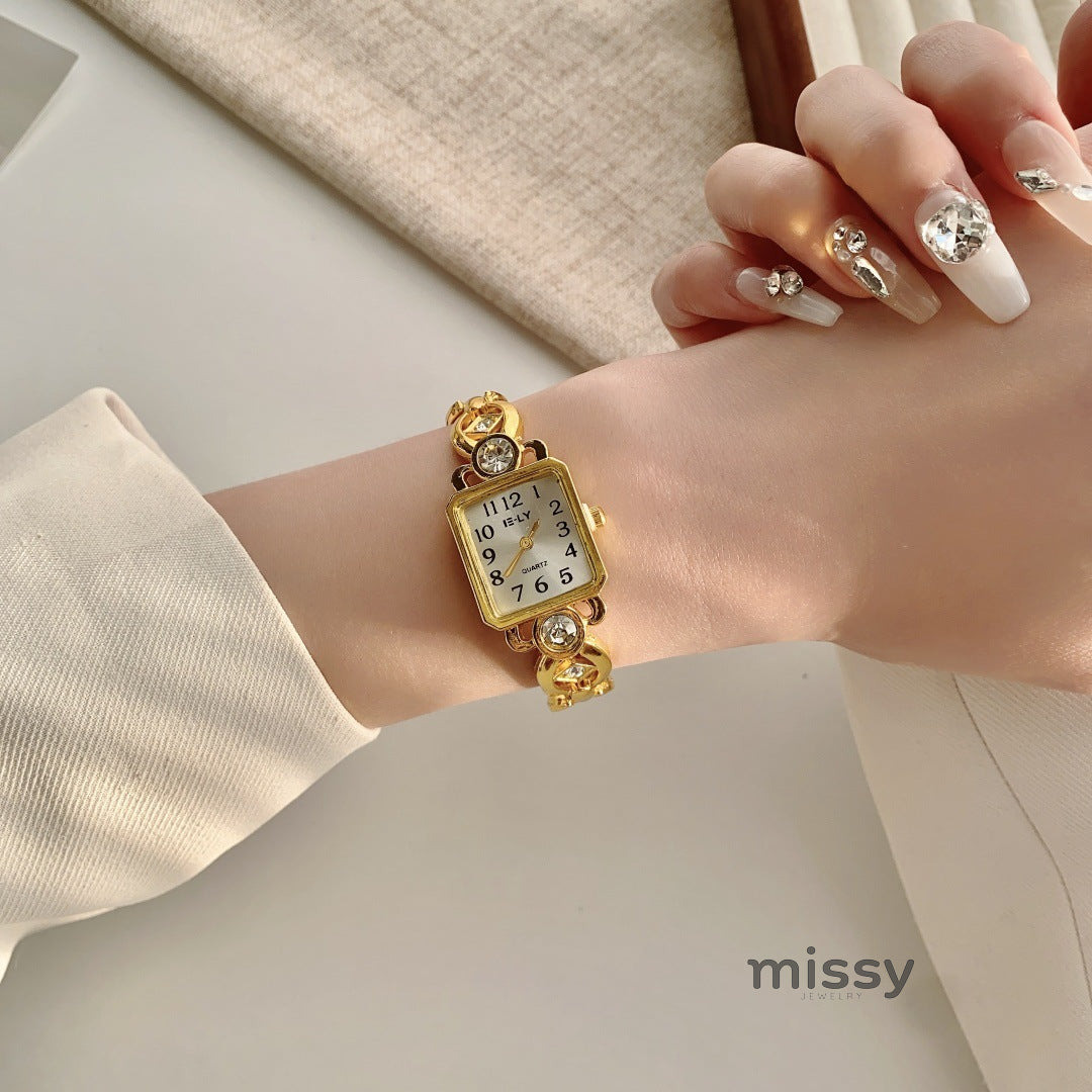 Parnika Gold Rectangle Watch [8H1U0L1W]