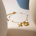 Pearl and Shell Pendant Bracelet [9BM9UC75]