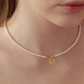 Pearl Bow Pendant Necklace [XC660CJ7]