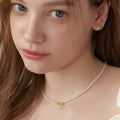 Pearl Bow Pendant Necklace [416GB8J6]