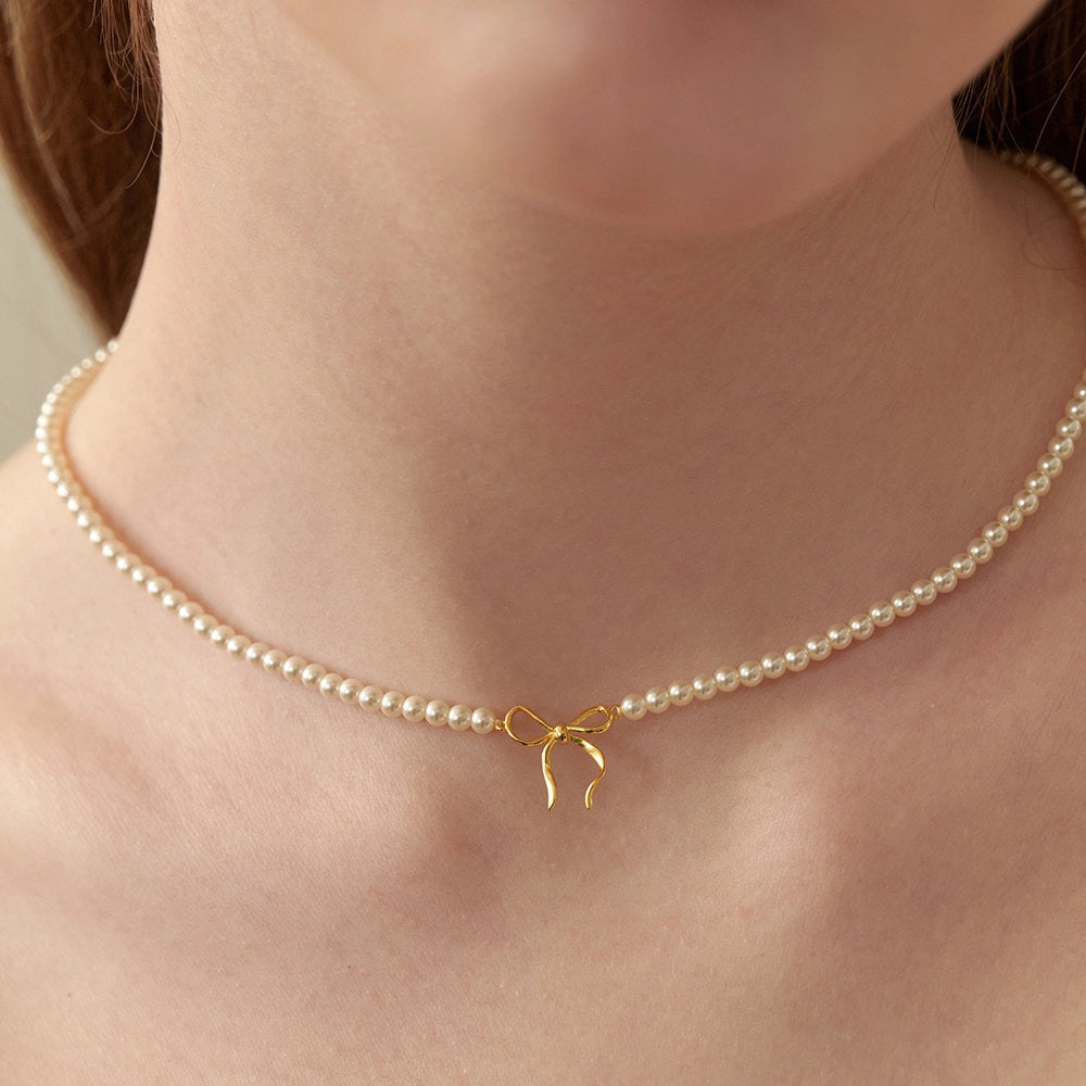 Pearl Bow Pendant Necklace [88BJGO7R]