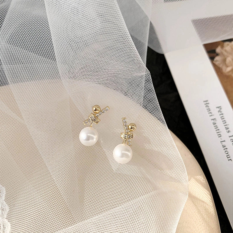 Pearl Bowknot Stud Earrings [XXAQ08FM]
