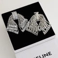 Rhinestone Bow Tassel Drop Earrings [IOS72S6M]