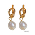 Ridhi Gold Asymmetric Pearl Studs [41P2ID2I]