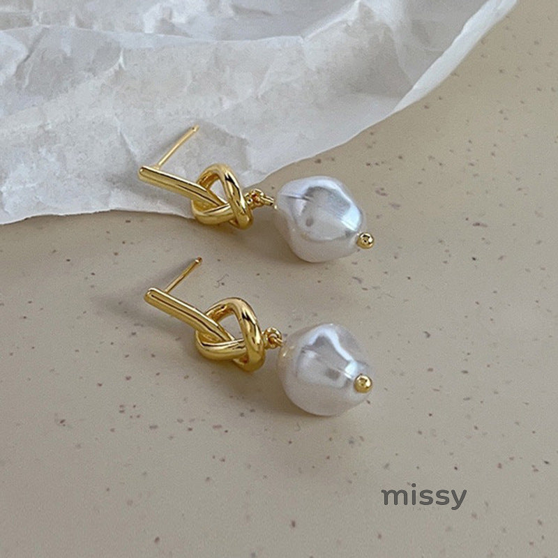 Ridhi Gold Asymmetric Pearl Studs [72VPW6EA]