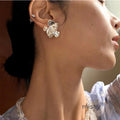 Ryla Sculptural Floral Studs [O34A81I2]
