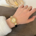 Vintage Camellia Leather Strap Watch [E2LJOMUM]