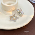 Vivi Star Huggie Earrings [SH3XSEP3]
